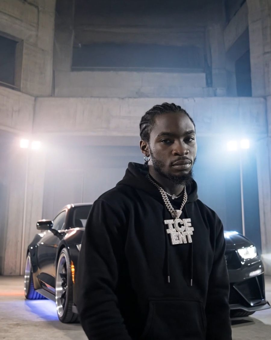 I_am_Iceberg in an ICE ENT chain and hoodie beside a car